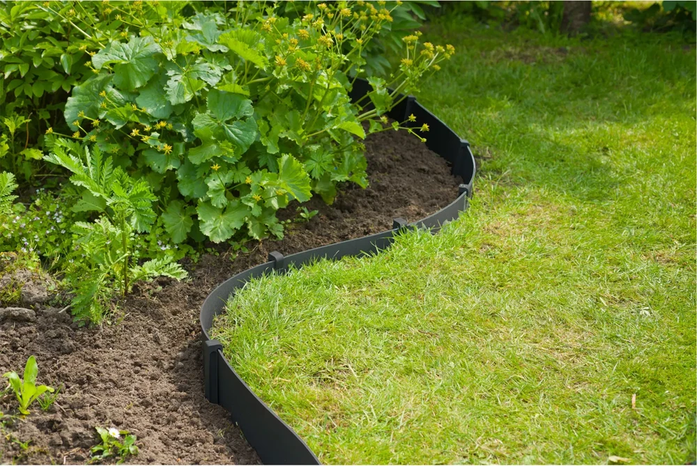 Tuinborderrand PE zwart 3mm - 10x0,15m - Nature Tuinborderrand PE Zwart 3mm - 10x0,15m - Nature -Buitentuinwinkel